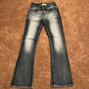 Stella slim fit, tailored bootcut jeans. Mid rise Waist is 25, length is 31.5.